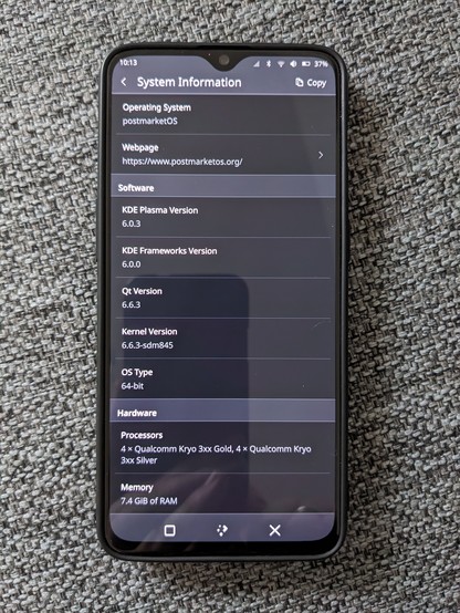 Photo of a OnePlus 6T running KDE Plasma Mobile 6.0.3 showing the system information.